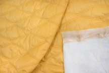 Курточная стёганая ткань waterproof желтый Курточная стёганая ткань waterproof желтый