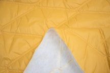 Курточная стёганая ткань waterproof желтый Курточная стёганая ткань waterproof желтый